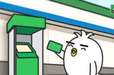 Tori studying Japanese ATMs