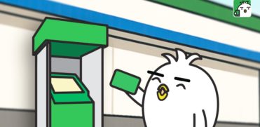 Tori studying Japanese ATMs