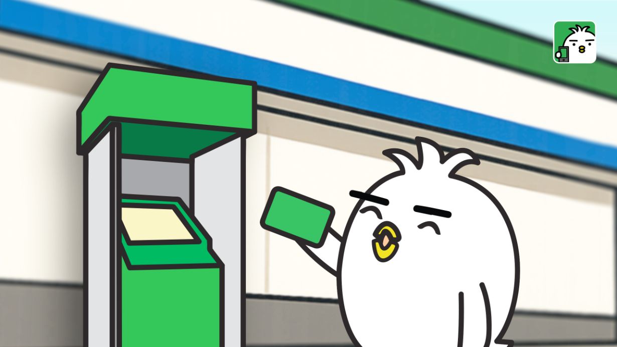 Tori studying Japanese ATMs