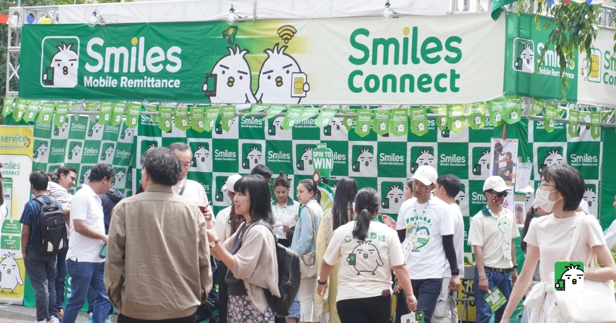 smiles booth with visitors at sendai