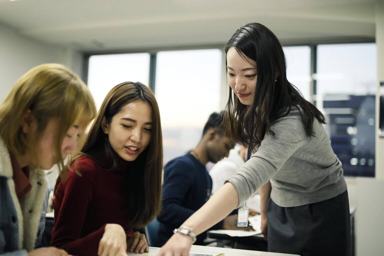 Japanese language school teacher and her students