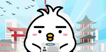Tori sedang memegang Visa di Jepang