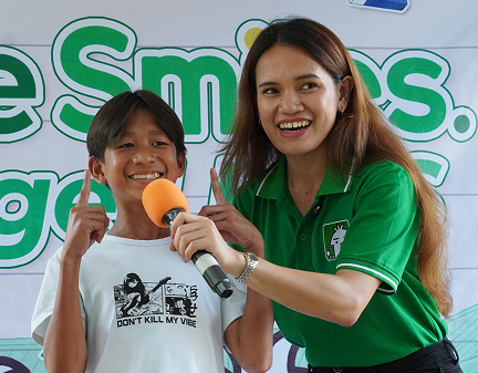 One Million Smiles 2026. Student having fun on the Smiles stage.