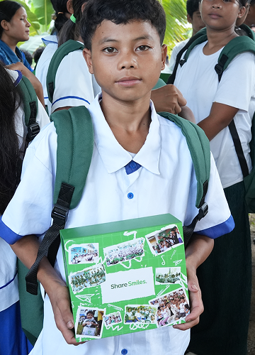 One Million Smiles 2026. A student with his Smiles package