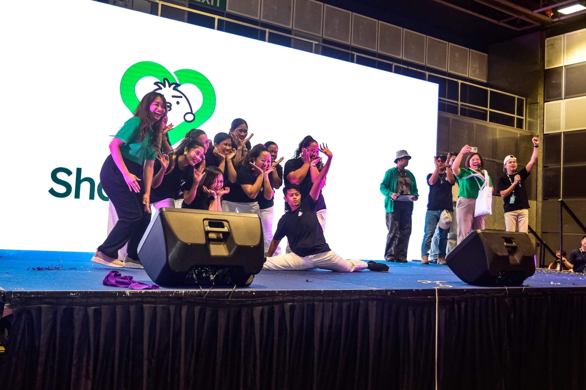 Smiles team members on stage