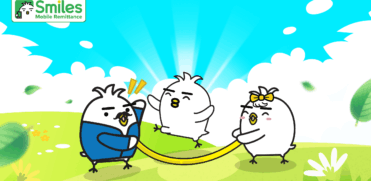 Tori playing with his family outdoors