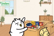 Tori packing a balikbayan box