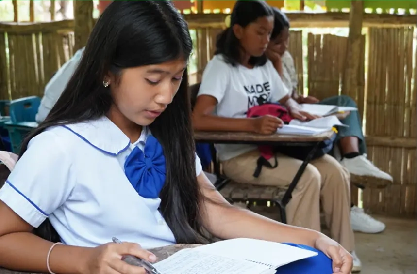 students at their classrooms in the Philippines