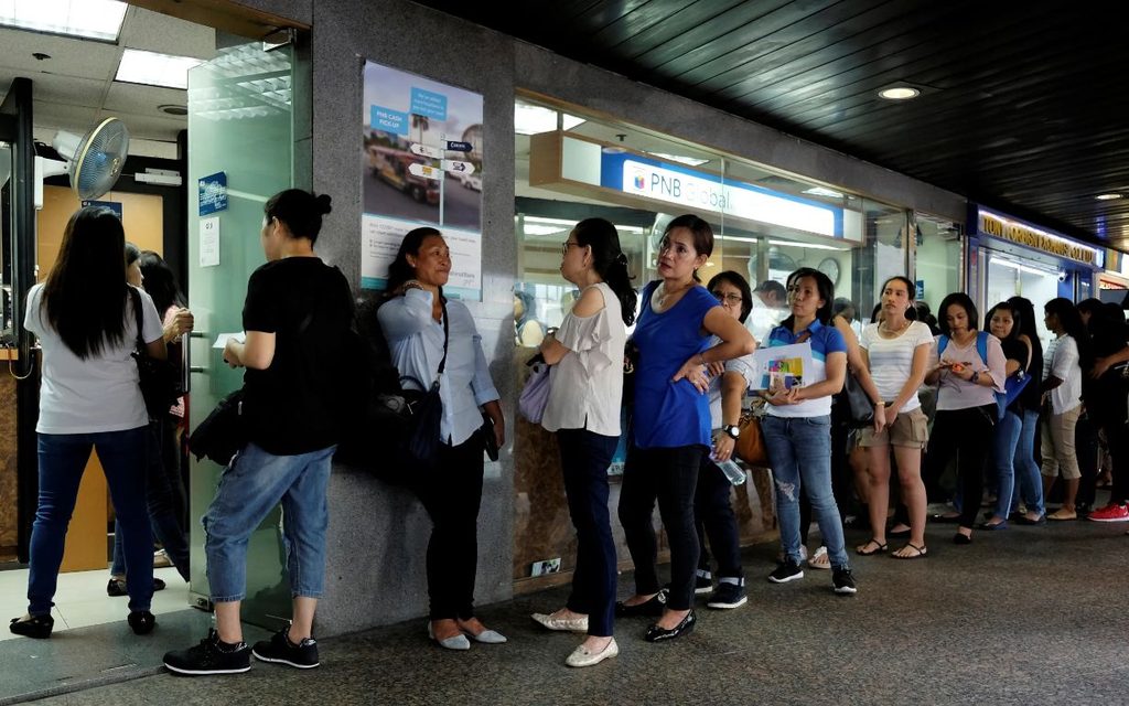 People in line at a remittance center